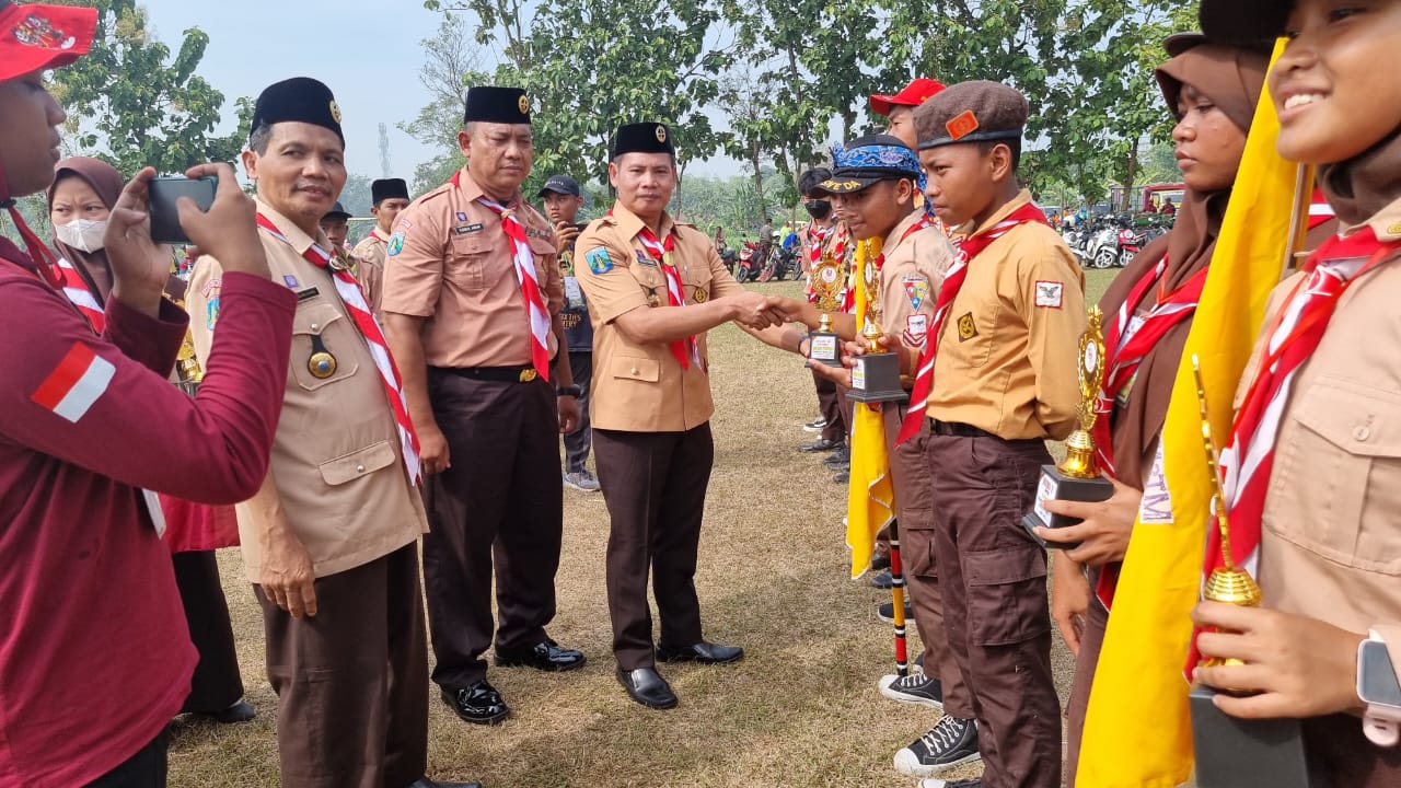 HARI PRAMUKA DENGAN TEMA 'Mengabdi Tanpa Batas untuk Membangun Ketangguhan Bangsa'.